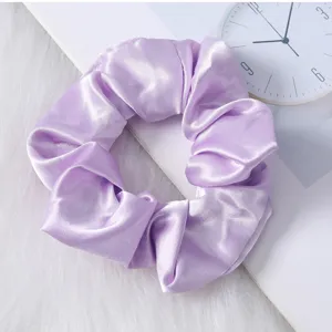 Coletero de satén de color sólido, textura de seda suave, accesorio para el cabello elegante y simple.