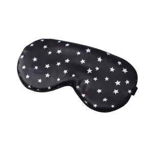 Black silk sleep mask with white star print, comfortable shading for travel and home use.