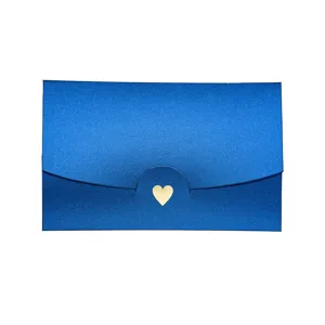 Detailed view of dark blue pearl paper envelope featuring elegant gold heart foil stamping design.