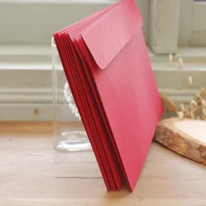 Red vintage paper envelopes set for greeting cards, invitations and stationery storage.