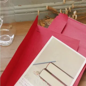 Retro minimalist red envelope for postcard storage, classic plain paper design for daily use.