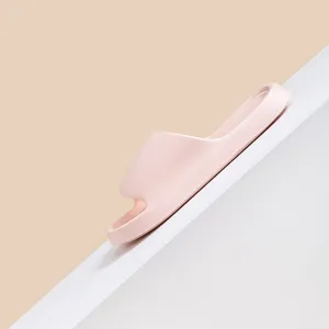 Pink EVA slide sandals for home summer wear, lightweight chunky casual slippers main view.