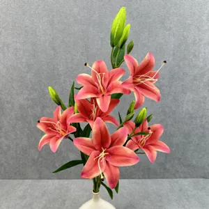 Artificial pink lily flower detail, realistic bouquet stems and buds for home decor.
