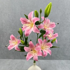 Detail view of 6-head artificial pink lily bouquet in white vase for home wedding decor.