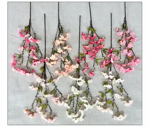 Branches de fleurs de cerisier artificielles en soie détail pour décoration florale DIY à la maison.