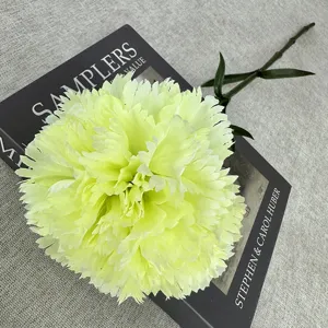 Single artificial carnation flower detail view, perfect for wedding home decor and photography props.