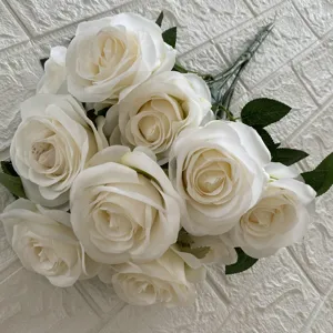 Artificial white rose bouquet detail shot, 10-head faux fabric flowers for home decoration.