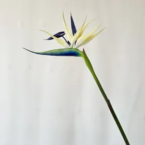 Artificial bird of paradise flower detail, realistic fake flower stem for home decor and photo props.