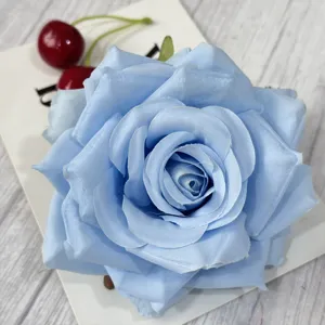 Light blue artificial rose flower head for wedding party decoration and floral craft projects