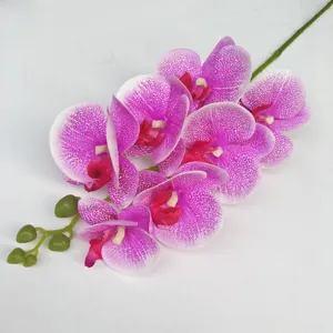 Detailed close-up of artificial phalaenopsis orchid branch, vibrant pink faux flowers for home decor.