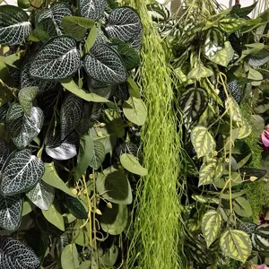 Artificial hanging green plant vine wall decor detail close-up foliage simulation