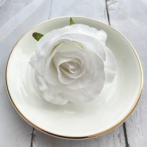 Artificial white rose flower head for wedding party home table decoration and DIY crafts.