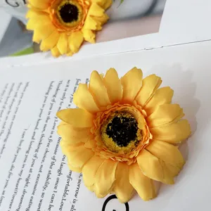 Closeup artificial yellow chrysanthemum flower, stunning photography prop for home table decor.