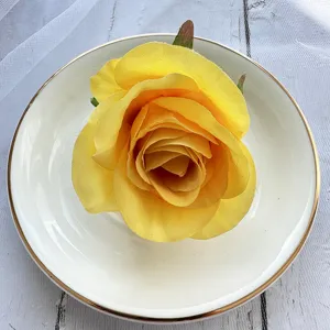 Artificial yellow rose flower detail shot, perfect for home decor, wedding and crafts.