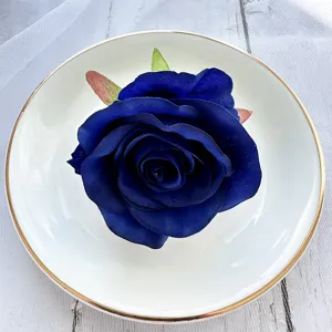 Artificial blue rose flower head for wedding decoration, DIY crafts and table centerpieces.