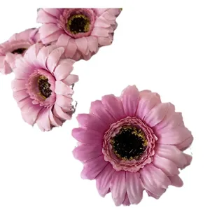 Artificial pink gerbera daisy flower heads for home decoration party crafts photo