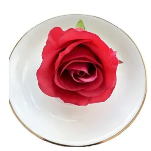 Artificial red rose flower head for DIY crafts wedding decor tabletop display top view