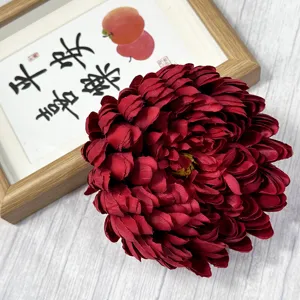 Close-up detail of dark red artificial chrysanthemum flower head, ideal for DIY flower arrangements.