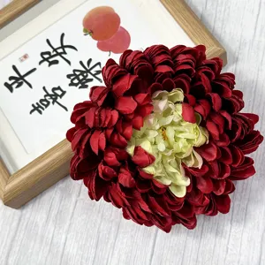 Artificial chrysanthemum flower head for hotel mall window decoration and floral arrangement.