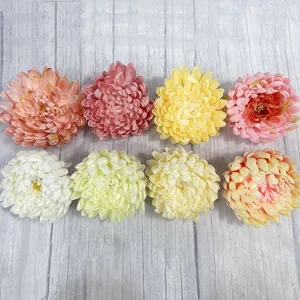 Artificial chrysanthemum flower heads for hotel, mall window decoration, and wall arrangements.