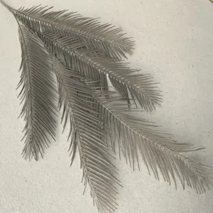 Artificial cycad leaf branch, grey decorative plant for Nordic home decor and floral art.