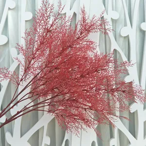 Red artificial rime grass branch detail showing rich forked texture for wedding backdrop decor.