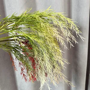 Artificial weeping grass hanging greenery plant for wedding decor and home interior display.