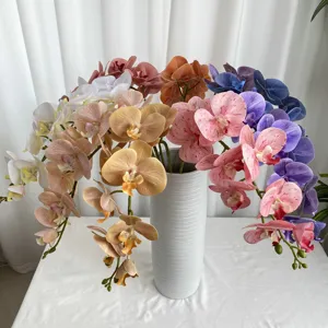 3D French Phalaenopsis artificial flowers for home wedding decor, vibrant orchid bouquet in grey vase.