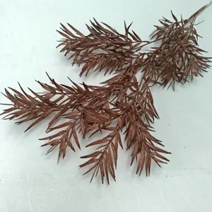 Artificial frosted bamboo leaves branch plastic pine foliage for wedding floral arrangement.