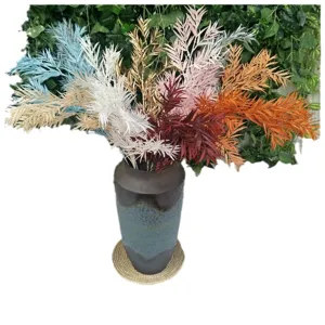 Colorful artificial bamboo leaves floral arrangement for wedding decoration and home styling.