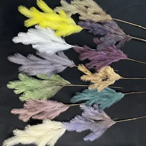 Detail view of multi-color artificial pampas grass stems, perfect for wedding and home decor.
