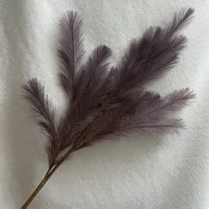 Close-up detail of artificial grey pampas grass branch, perfect for wedding and home decor styling.