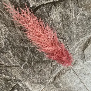 Artificial pink reed flower detail shot, perfect for home living room decor and floral art.