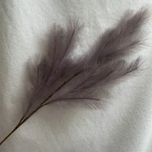Artificial pampas grass faux reed floral detail view for wedding home decoration and crafts.
