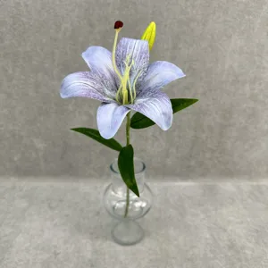 Detail view of 3D printed artificial lily flower in glass vase for home and wedding decor.
