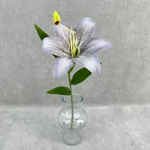Artificial lily flower single stem detail close-up decorative floral arrangement prop