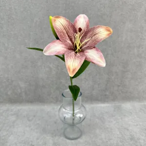 Detailed view of a realistic 3D printed artificial lily flower in a clear glass vase for decor.