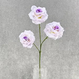 Details of 3-head artificial purple rose branch in glass vase for home decor and party styling.