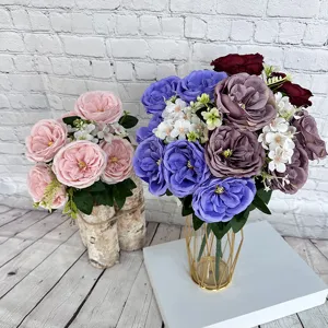Detailed view of 9-head artificial rose bouquet and elegant floral arrangement scene display.