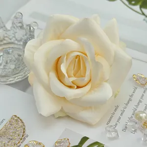 Artificial white rose head flower detail close up for wedding decoration floral