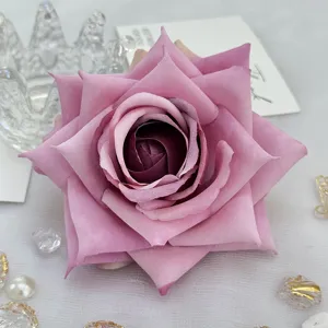 Artificial fabric rose flower head pink gradient for DIY craft wedding floral decor.
