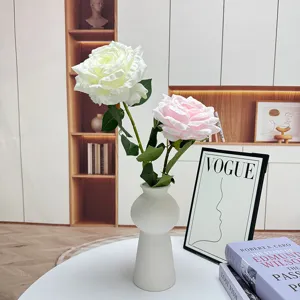 Artificial rose flowers bouquet in white vase for home decor, wedding and photography props.