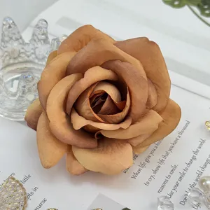 Artificial brown rose flower head for wedding decor, floral arrangement and DIY crafts.