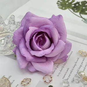 Artificial purple rose flower head for wedding decoration, floral arrangement, and DIY crafts.