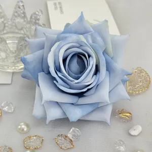 Blue artificial rose flower head detail close up view, perfect for wedding decoration DIY.