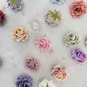 Artificial rose flower heads for wedding decoration, floral wreath, and DIY craft projects.