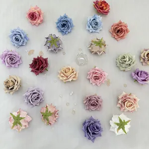 Artificial rose flower heads for DIY crafts, wedding decorations and floral arrangements.