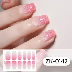 Detailed close-up of pink gradient glitter nail stickers showing shimmering texture and neat finish.