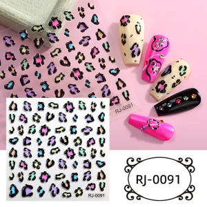 Close-up detail of 5D embossed leopard print nail art stickers, colorful and textured design.