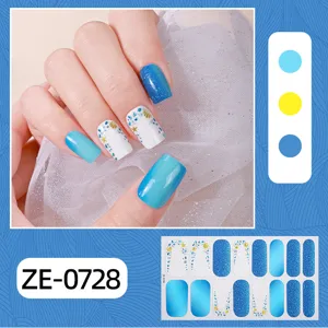 Detail view of 16-finger French blue gradient glitter seashell nail wraps and sticker sheet.